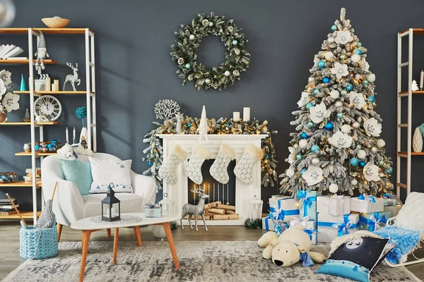 https://st.depositphotos.com/20751094/53505/i/450/depositphotos_535057194-stock-photo-christmas-living-room-blue-white.jpg