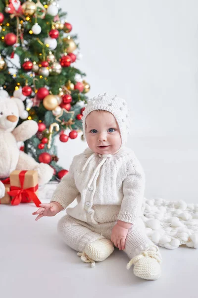 Santa Baby Christmas Tree Background Happy New Year Child Knitted — Stock Photo, Image