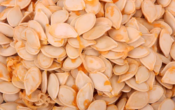 Pumpkin seeds background — Stock Photo, Image