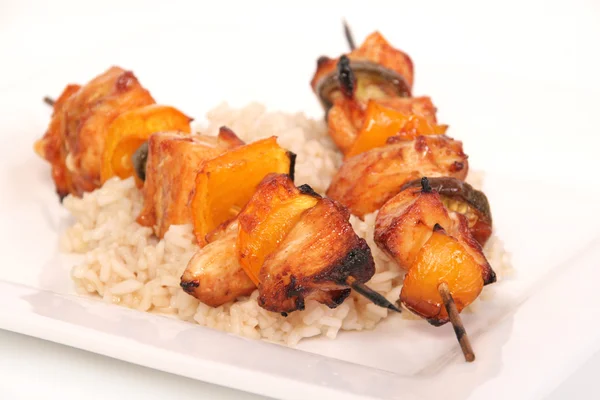 Chicken kebab on rice — Stock Photo, Image