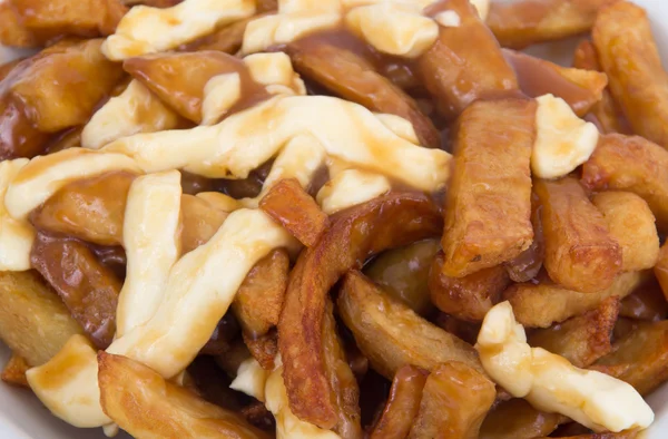 Poutine quebec posiłek z frytkami — Zdjęcie stockowe