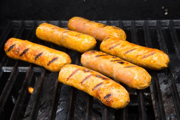 Italienska korvar på grillen — Stockfoto