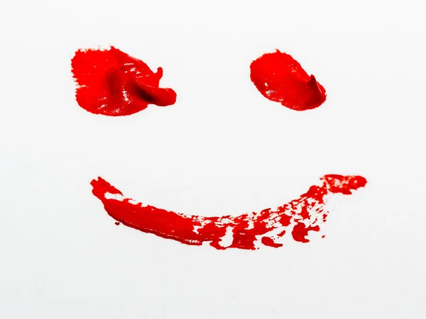 Faccia sorridente rossa — Foto Stock