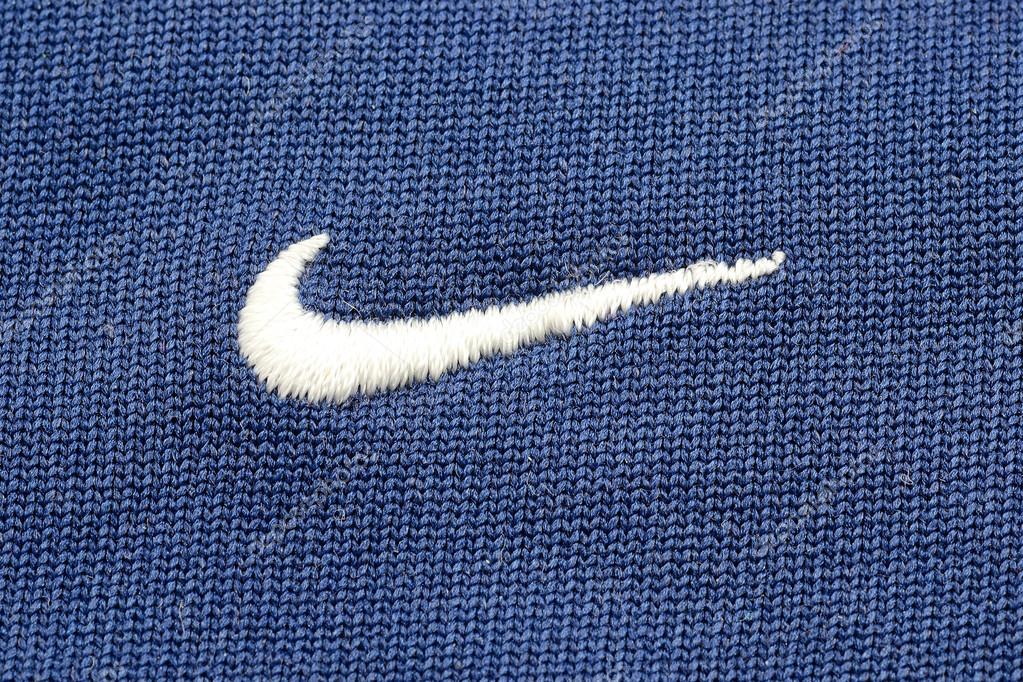 Nike Logo On A Blue Shirt