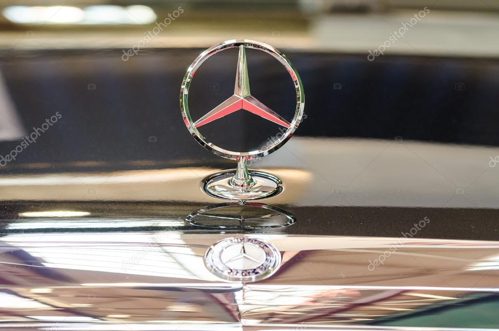 BUCHAREST, ROMANIA - OCTOBER 11: Mercedes Benz Sign on October 11, 2013 in Bucharest, Romania. Multinational division of the German manufacturer Daimler AG the brand is used for luxury automobiles.