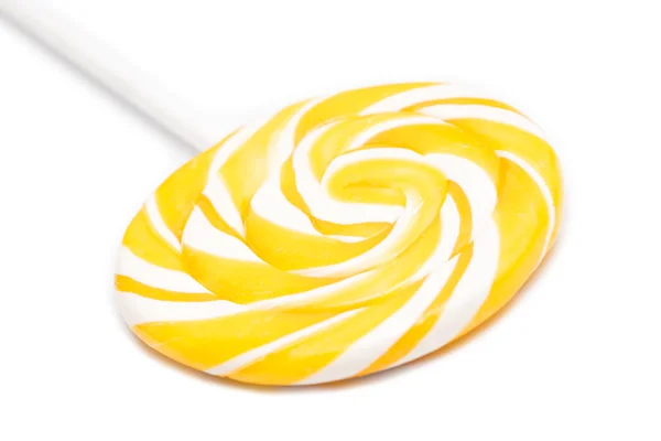 Söt gul spiral lollipop — Stockfoto