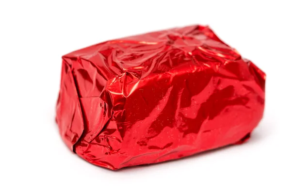 Caramelo de chocolate envuelto rojo — Foto de Stock