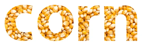 Кукурузное слово из кукурузных семян — стоковое фото