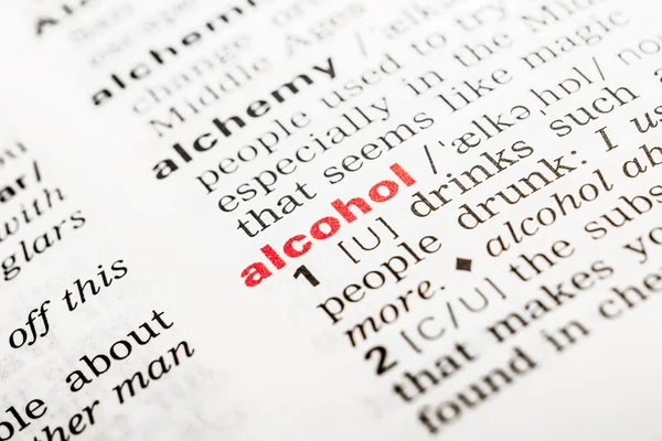 Определение слова Алкоголь в словаре — стоковое фото
