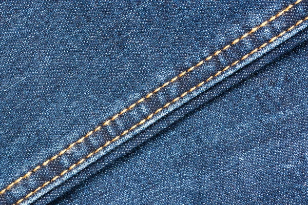 Textura azul jeans jeans jeans com costuras — Fotografia de Stock