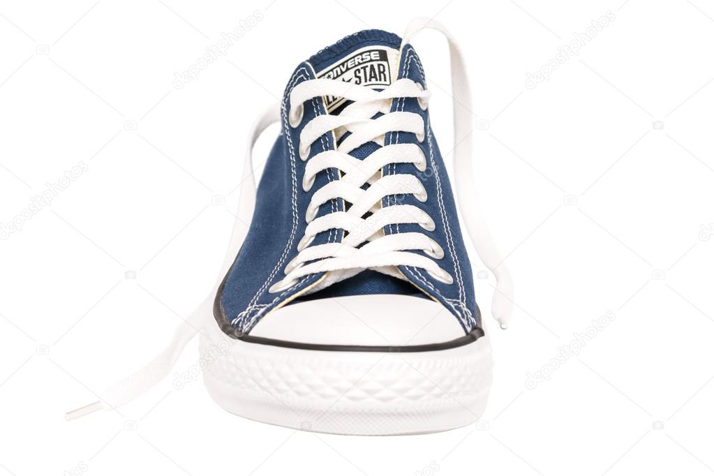 BUCHAREST, ROMANIA - MARCH 18, 2014: All Star Converse Sneakers Isolated On White. Founded in 1908 is an American lifestyle company with a production output of shoes and lifestyle fashion.
