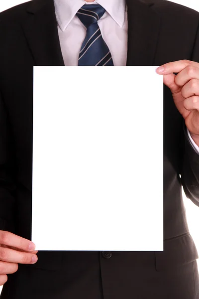 Businessman holding a blank white board — Stock Photo, Image