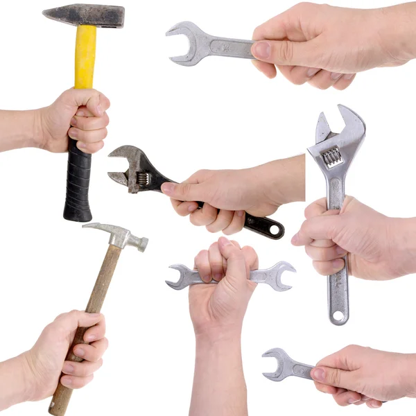 Zestaw narzędzi roboczych trzymając się za ręce — Zdjęcie stockowe