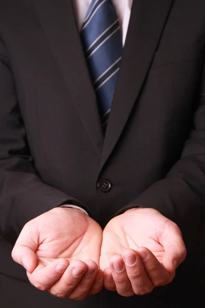 Podnikatel ruce, jako by držel něco — Stock fotografie