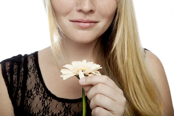Young beautiful blond haired girl playing he loves me — Stock Photo, Image