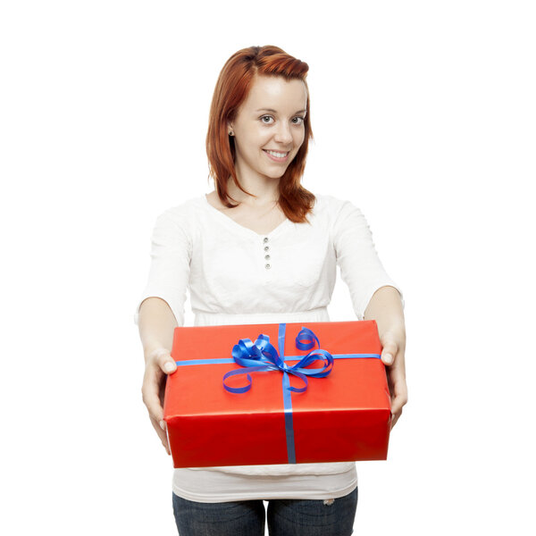 young beautiful red haired girl has a gift for you