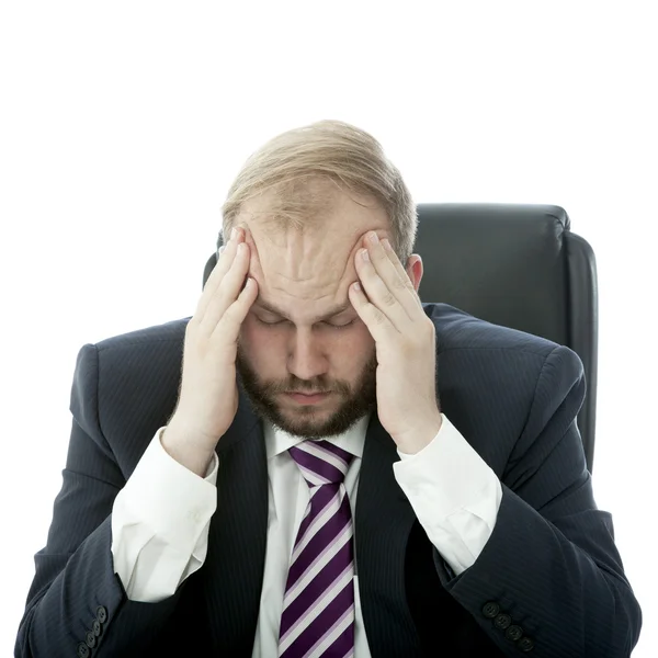 Beared biznesmen ma bóle głowy — Zdjęcie stockowe