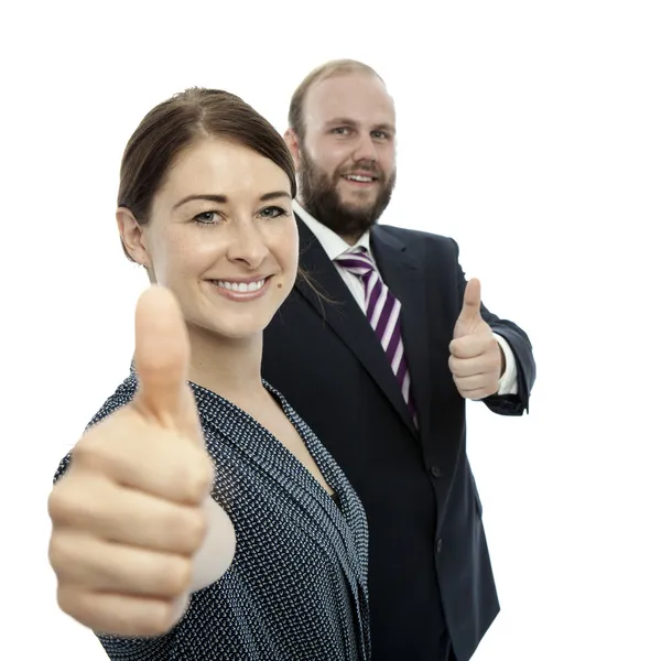 Молодая брюнетка женщина и бородатый бизнесмен большой палец вверх — стоковое фото
