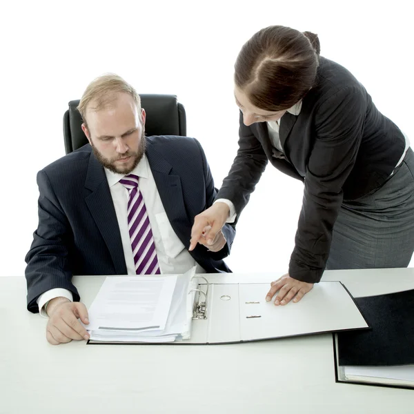 Beard business man brunette woman at desk explain documents — Stock Photo, Image