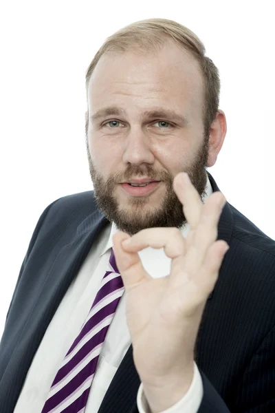 Barba homem de negócios dizer que é perfeito com o dedo — Fotografia de Stock