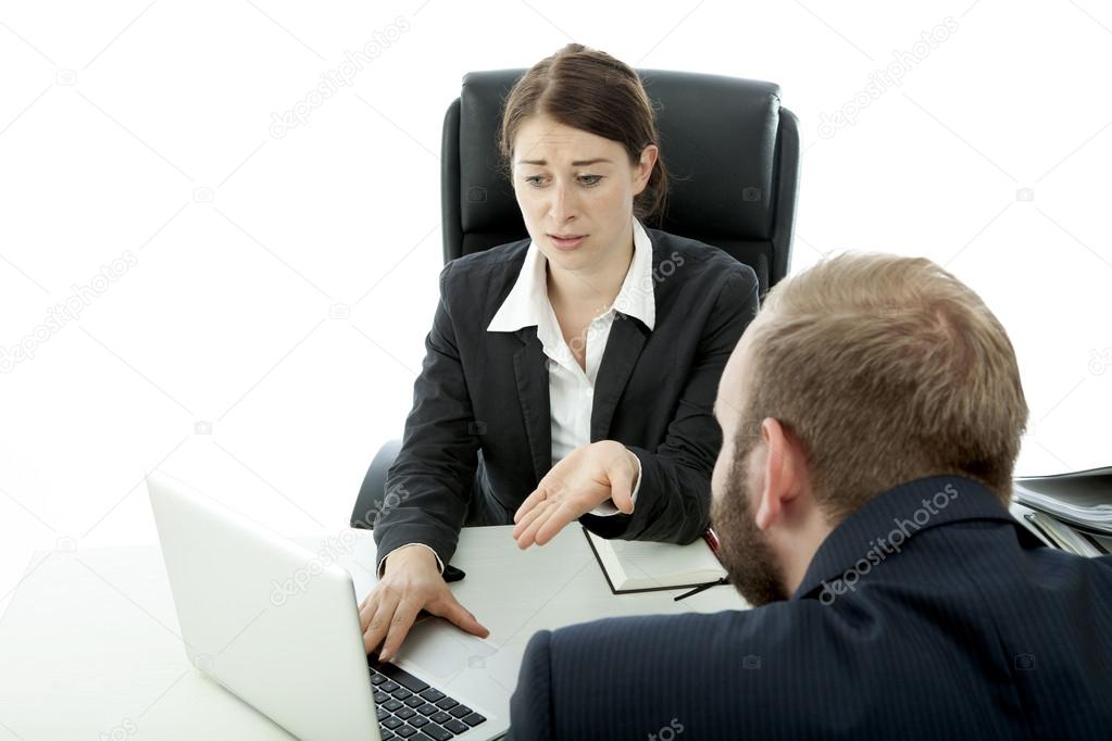 beard business man brunette woman at desk worry about laptop infos