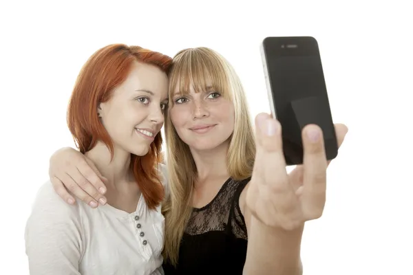 Young beautiful red and blond haired girls doing a self portrait — Stock Photo, Image