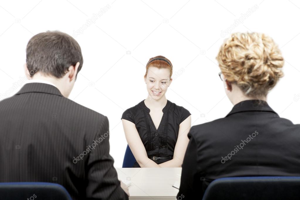 Personnel officers interviewing a candidate