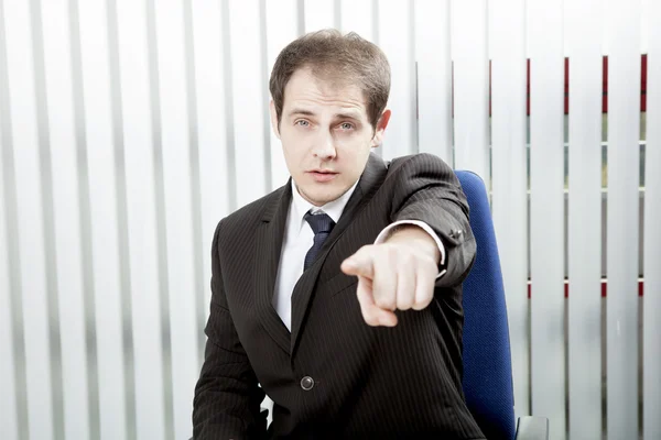 Empresário apontando um dedo — Fotografia de Stock