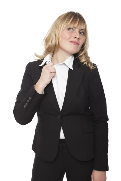 Businesswoman pulling at her collar — Stock Photo, Image