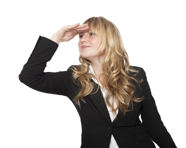 Playful businesswoman peering into the distance — Stock Photo, Image