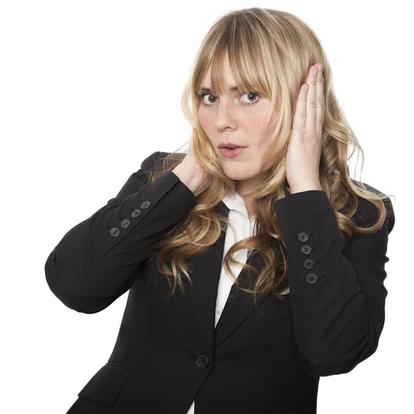 Businesswoman covering her ears — Stock Photo, Image