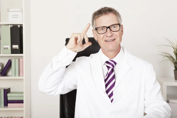 Male doctor having a brainwave — Stock Photo, Image