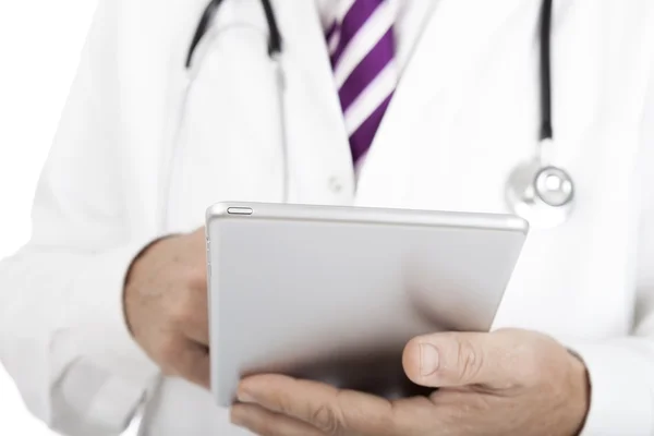 Doctor working on a tablet -pc — Stock Photo, Image