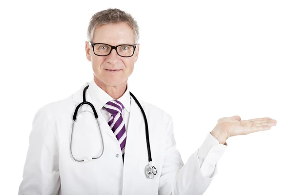 Doctor holding out his empty hand — Stock Photo, Image