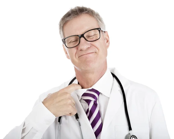 Smiling doctor loosening his tie — Stock Photo, Image