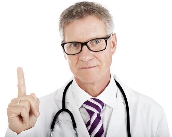 Middle-aged doctor pointing above his head — Stock Photo, Image