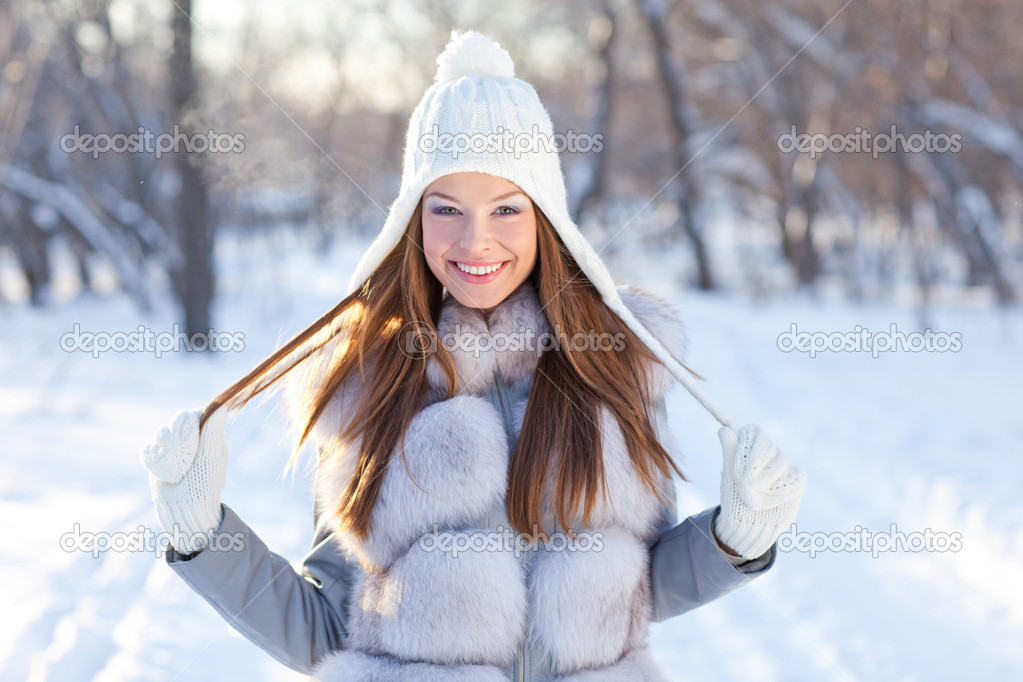 Portrait of young beautiful woman outdoor