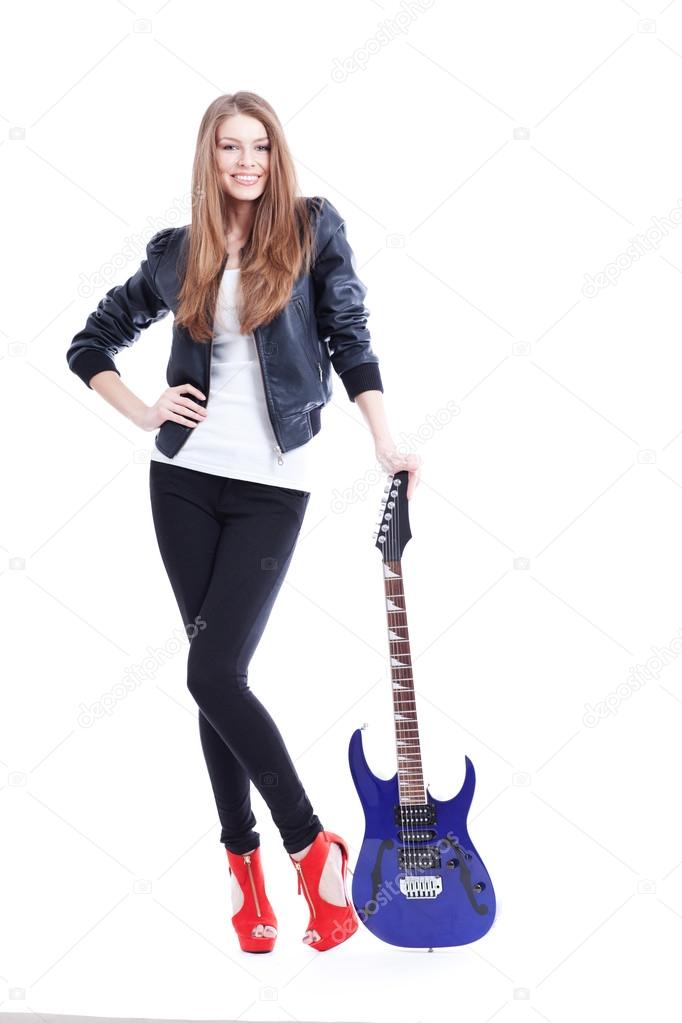 Young beautiful woman whith electric guitar