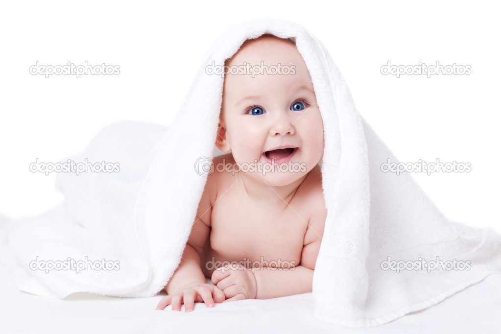 Baby girl under the white towel