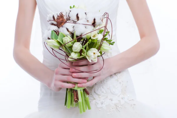 Wedding bouquet at bride's hands — Stock Photo, Image