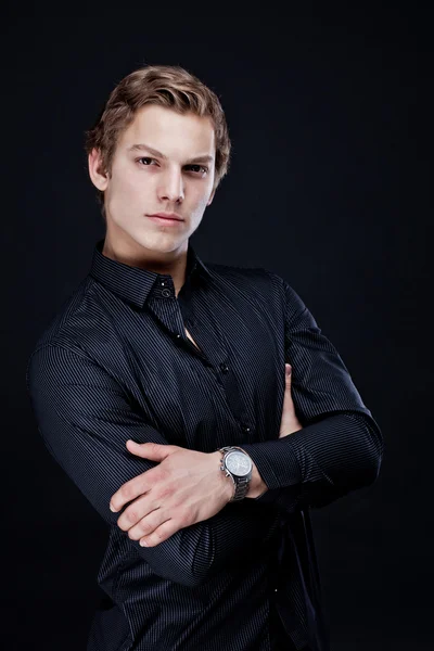 Portrait of sexy macho man over dark background — Stock Photo, Image