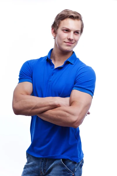 Retrato de um jovem bonito vestindo azul t-short — Fotografia de Stock