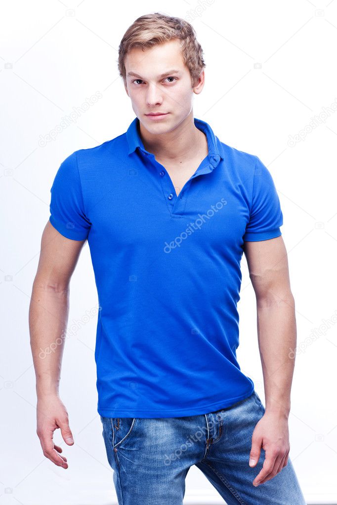 Portrait of a young handsome man wearing blue t-shirt
