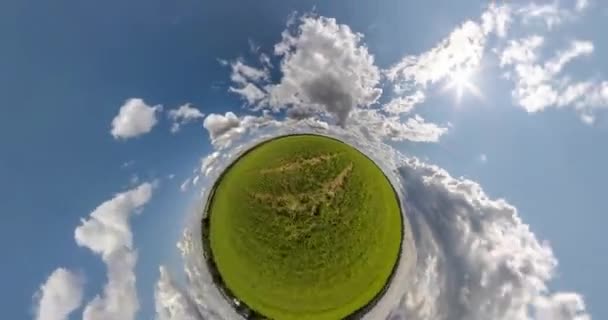 Abstract Spiral Rotation Green Sphere Spins Overcast Blue Sky Clouds — Stock videók