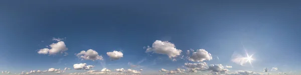 blue sky hdr 360 panorama with white beautiful clouds in seamless projection with zenith for use in 3d graphics or game development as sky dome or edit drone shot for sky replacement