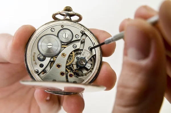 Pocket watch reparation. — Stockfoto