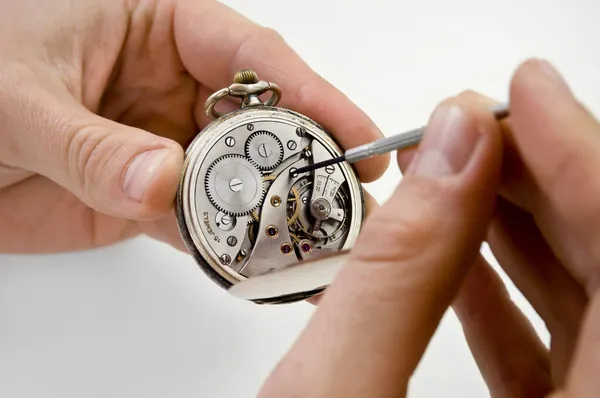 Pocket watch reparation. — Stockfoto
