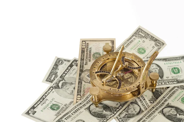 Financial concept. Old brass navigation sextant on dollar bills. — Stock Photo, Image