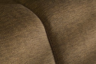 Retro, brown, elegant upholstery details of a sofa clipart