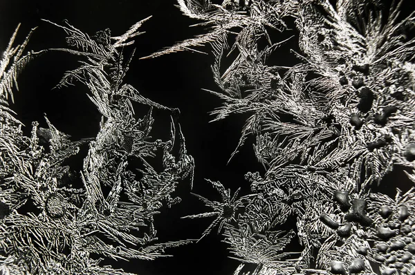 Abstract frost patterns on window glass. — Stock Photo, Image